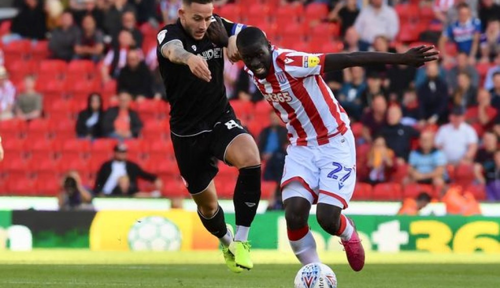 A generic square placeholder image with rounded corners in a figure.