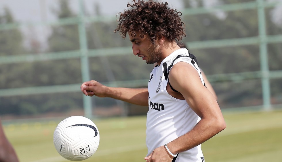 A generic square placeholder image with rounded corners in a figure.