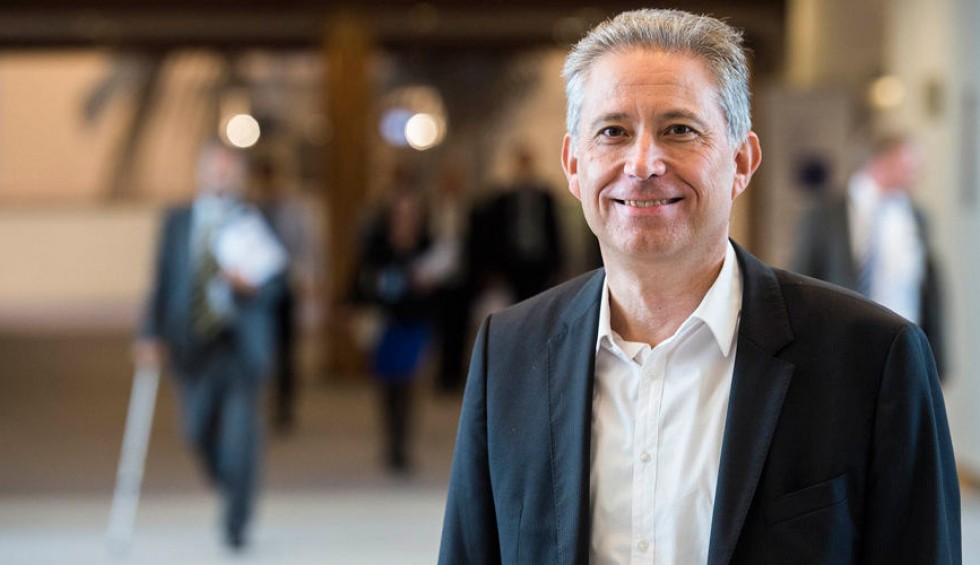 A generic square placeholder image with rounded corners in a figure.