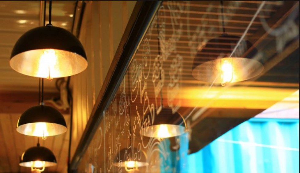 A generic square placeholder image with rounded corners in a figure.