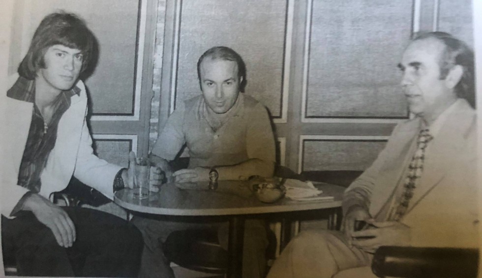 A generic square placeholder image with rounded corners in a figure.