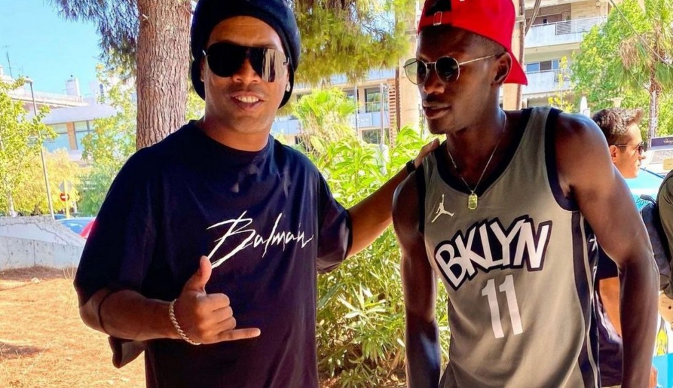 A generic square placeholder image with rounded corners in a figure.