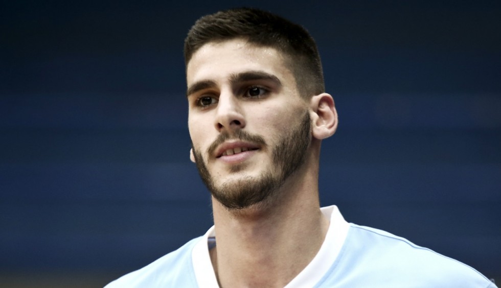 A generic square placeholder image with rounded corners in a figure.