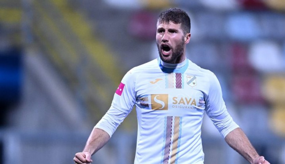 A generic square placeholder image with rounded corners in a figure.