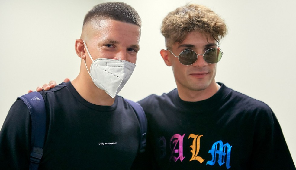 A generic square placeholder image with rounded corners in a figure.