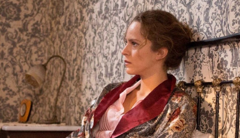 A generic square placeholder image with rounded corners in a figure.