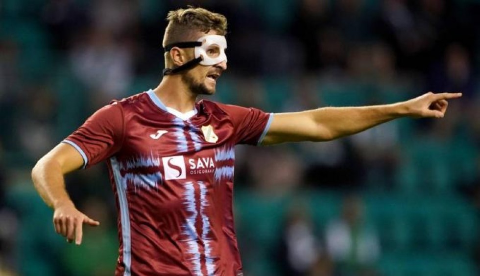 A generic square placeholder image with rounded corners in a figure.