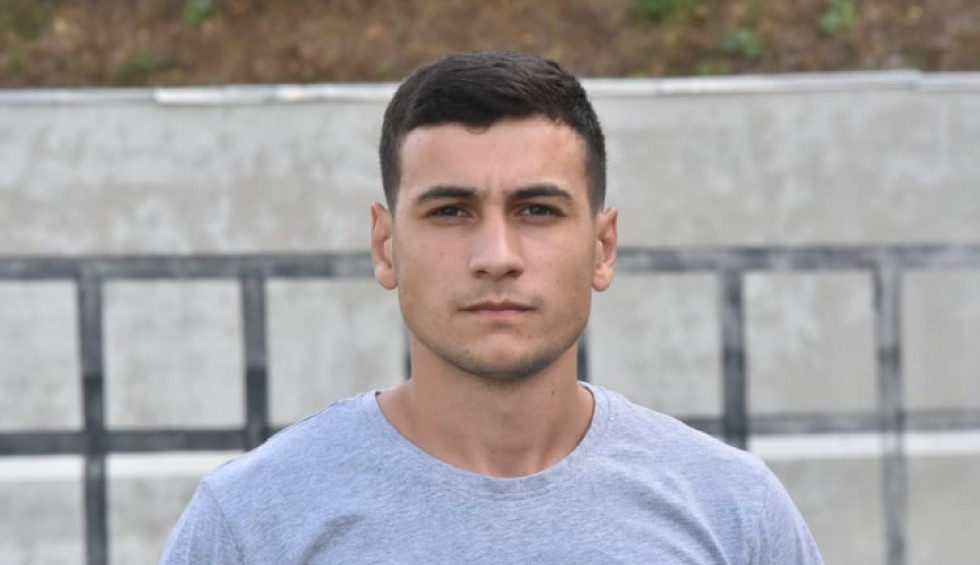 A generic square placeholder image with rounded corners in a figure.