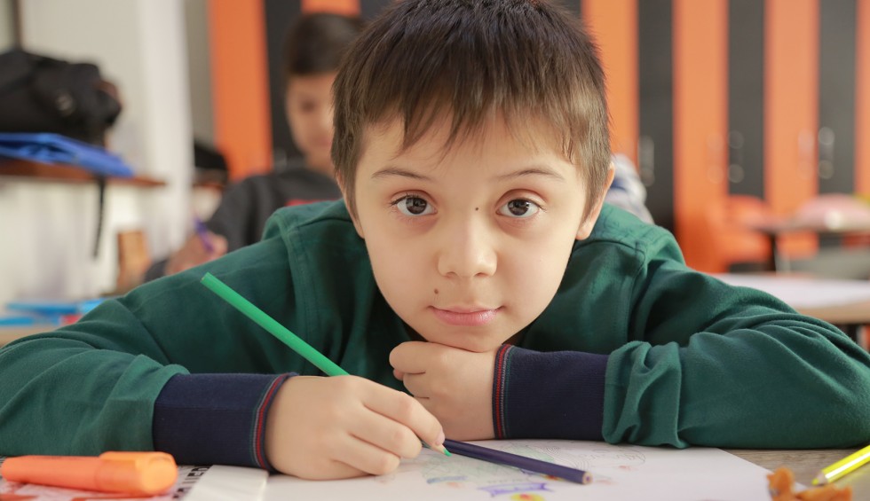 A generic square placeholder image with rounded corners in a figure.