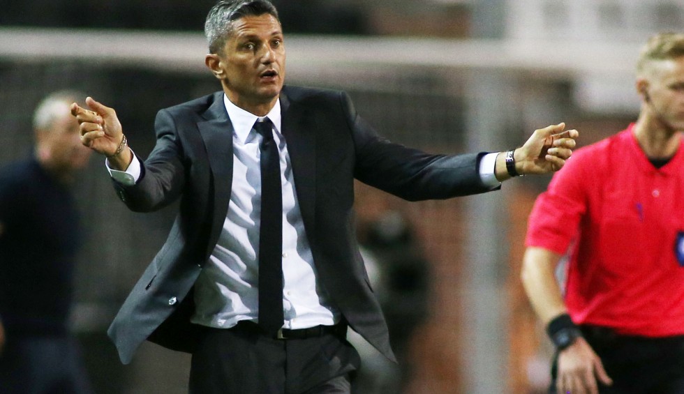 A generic square placeholder image with rounded corners in a figure.