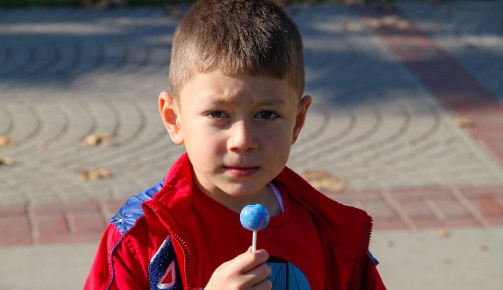 A generic square placeholder image with rounded corners in a figure.