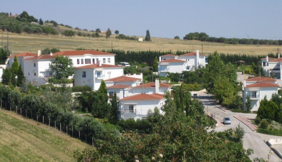 A generic square placeholder image with rounded corners in a figure.