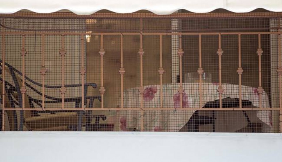 A generic square placeholder image with rounded corners in a figure.