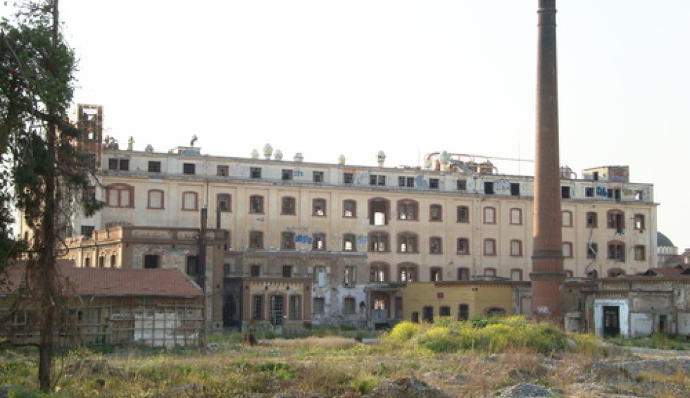 A generic square placeholder image with rounded corners in a figure.