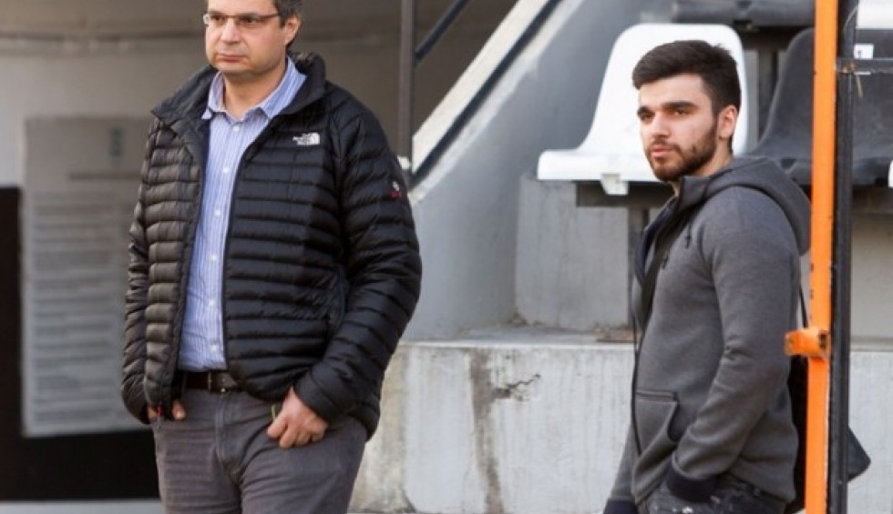 A generic square placeholder image with rounded corners in a figure.