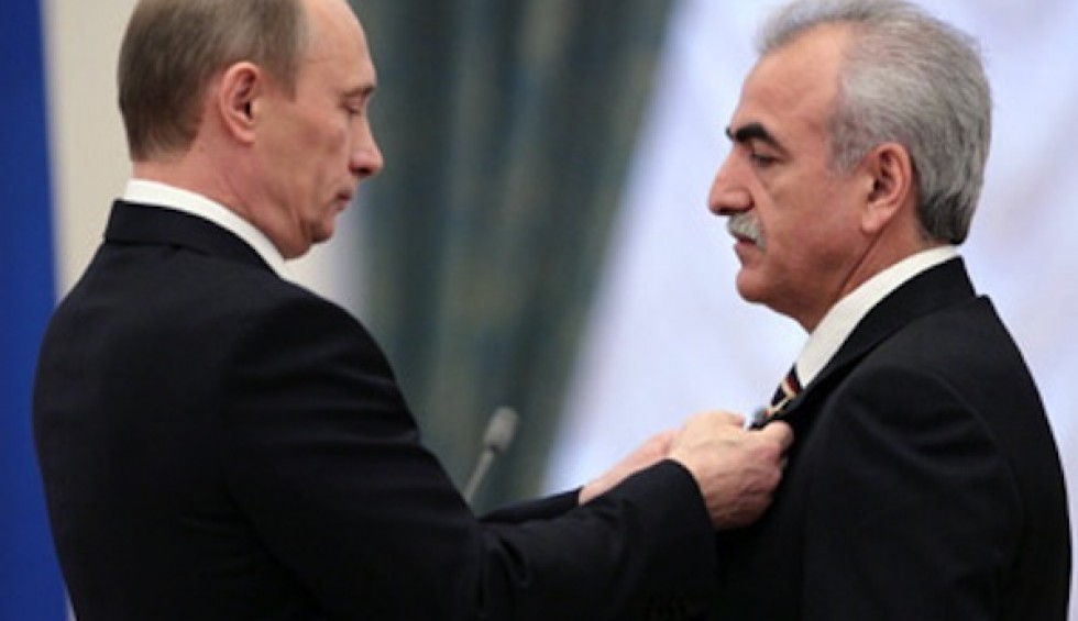 A generic square placeholder image with rounded corners in a figure.