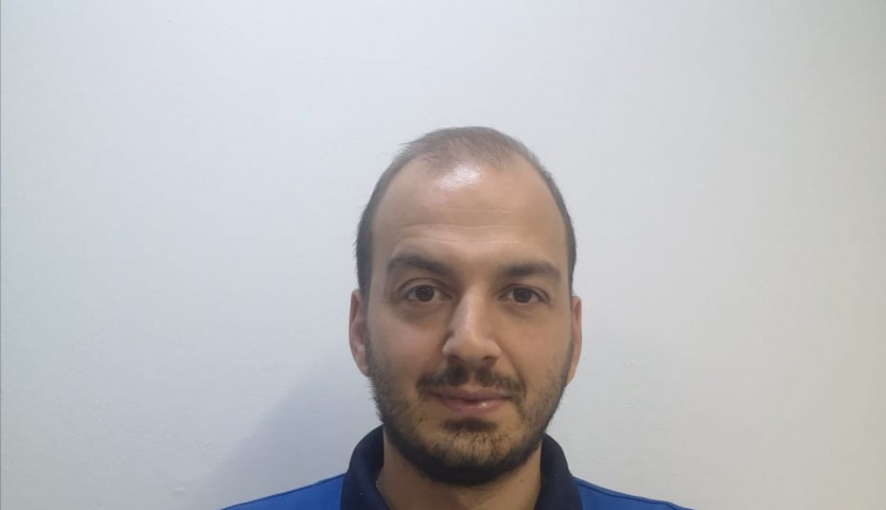 A generic square placeholder image with rounded corners in a figure.