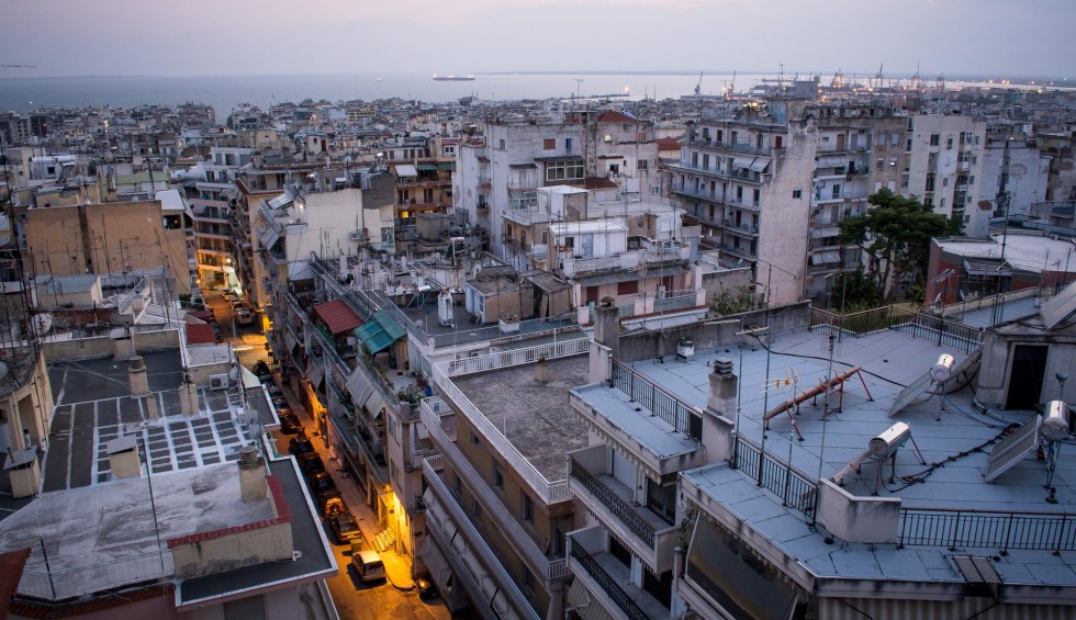 A generic square placeholder image with rounded corners in a figure.