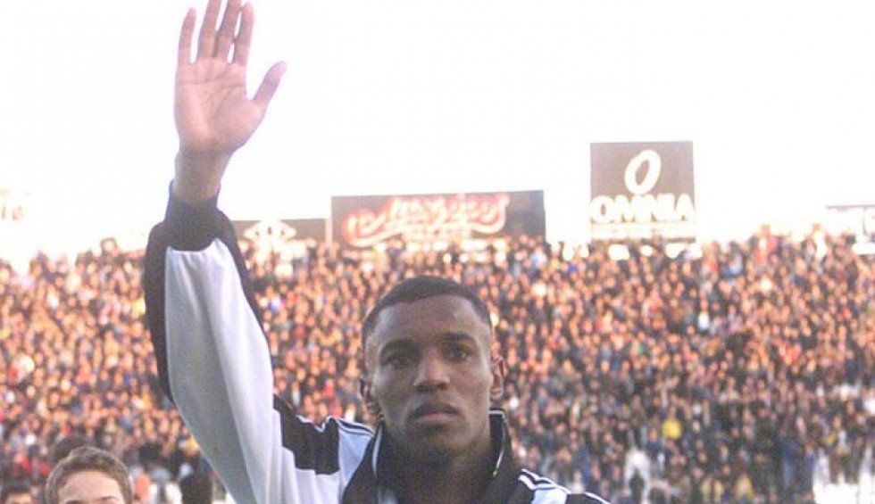 A generic square placeholder image with rounded corners in a figure.