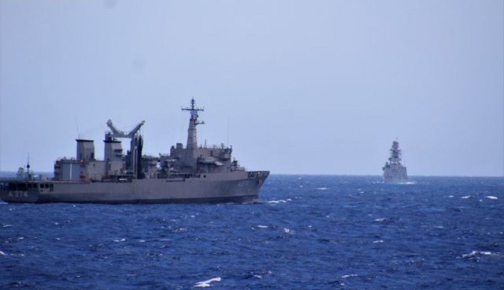 A generic square placeholder image with rounded corners in a figure.