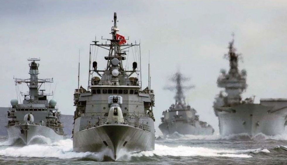 A generic square placeholder image with rounded corners in a figure.