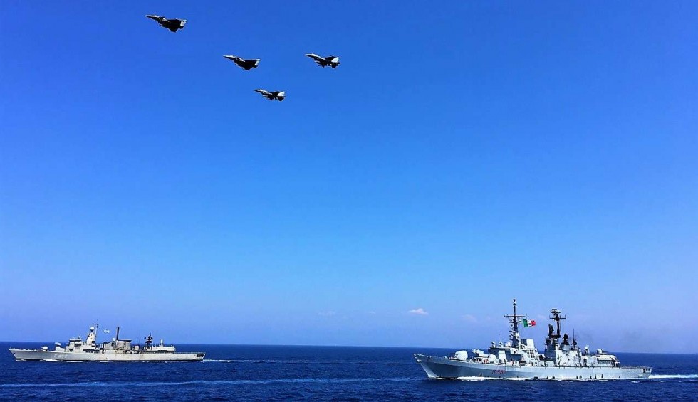 A generic square placeholder image with rounded corners in a figure.