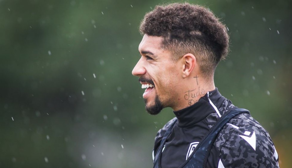 A generic square placeholder image with rounded corners in a figure.