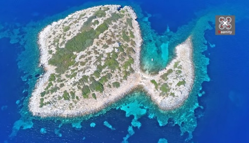 A generic square placeholder image with rounded corners in a figure.