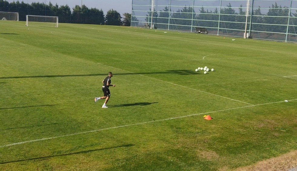 A generic square placeholder image with rounded corners in a figure.