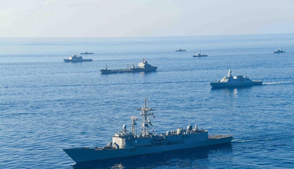 A generic square placeholder image with rounded corners in a figure.