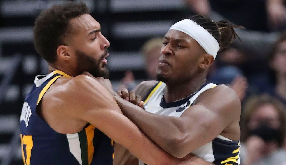 A generic square placeholder image with rounded corners in a figure.