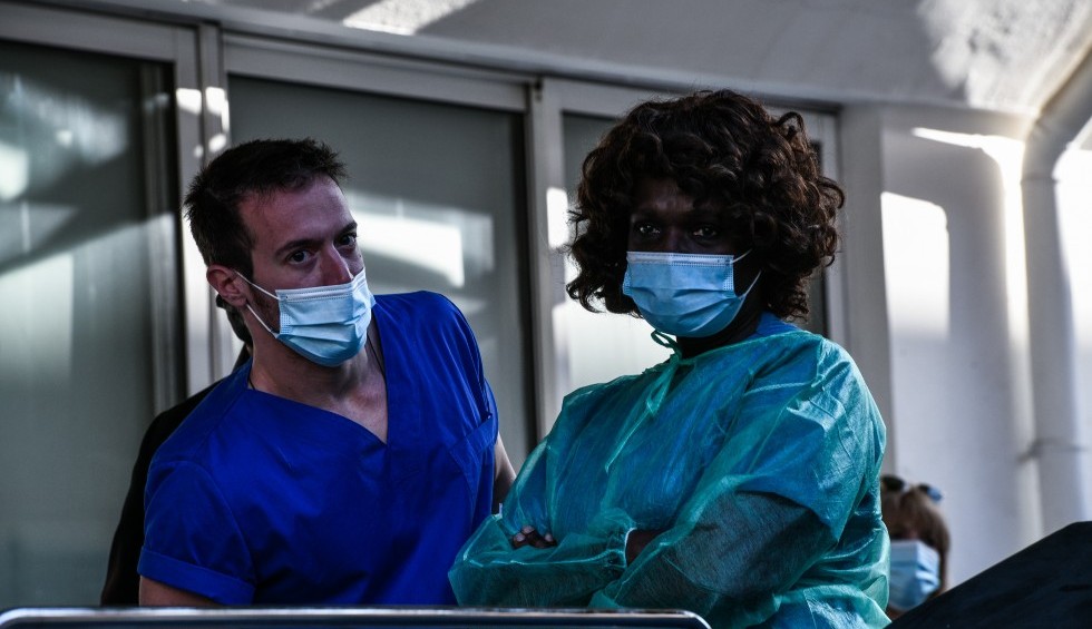 A generic square placeholder image with rounded corners in a figure.