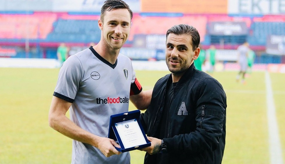 A generic square placeholder image with rounded corners in a figure.