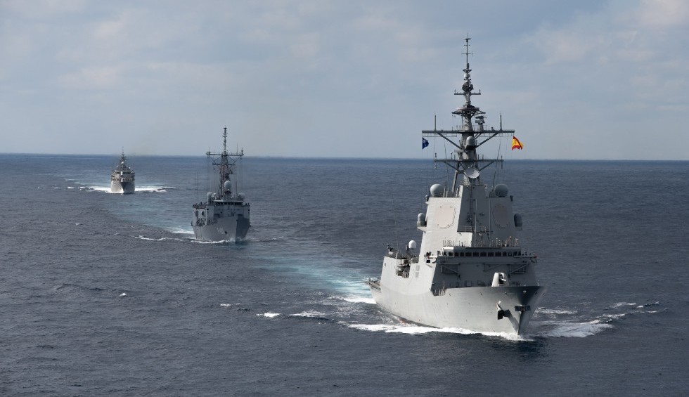 A generic square placeholder image with rounded corners in a figure.