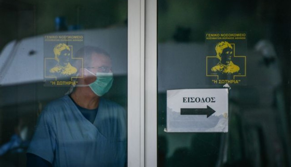 A generic square placeholder image with rounded corners in a figure.