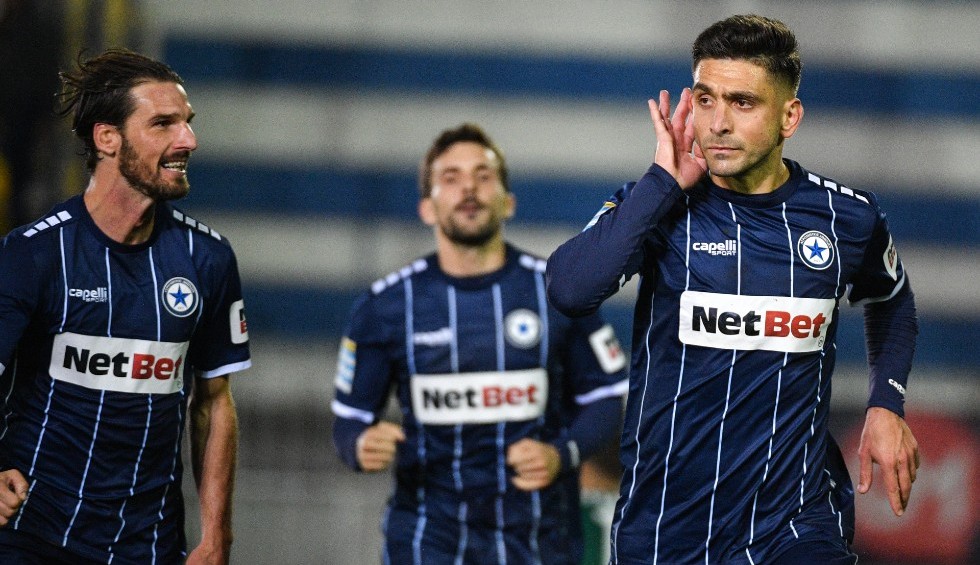 A generic square placeholder image with rounded corners in a figure.