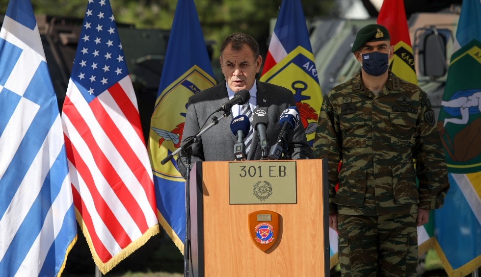 A generic square placeholder image with rounded corners in a figure.