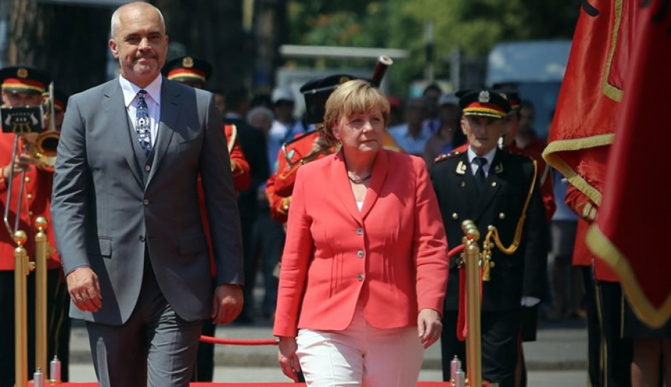 A generic square placeholder image with rounded corners in a figure.