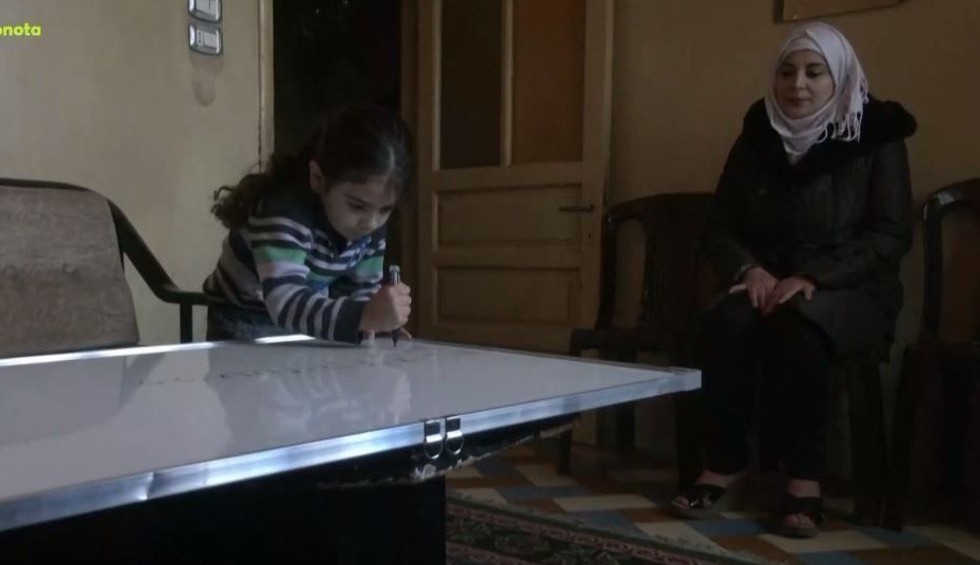 A generic square placeholder image with rounded corners in a figure.