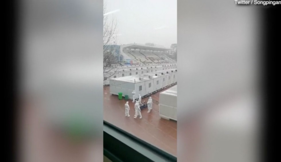 A generic square placeholder image with rounded corners in a figure.