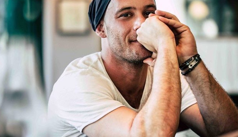 A generic square placeholder image with rounded corners in a figure.