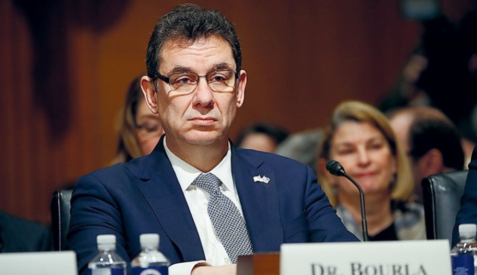 A generic square placeholder image with rounded corners in a figure.