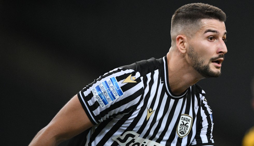 A generic square placeholder image with rounded corners in a figure.