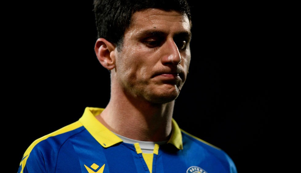 A generic square placeholder image with rounded corners in a figure.