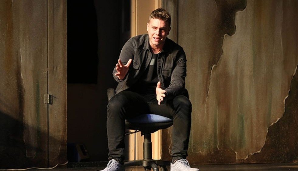 A generic square placeholder image with rounded corners in a figure.