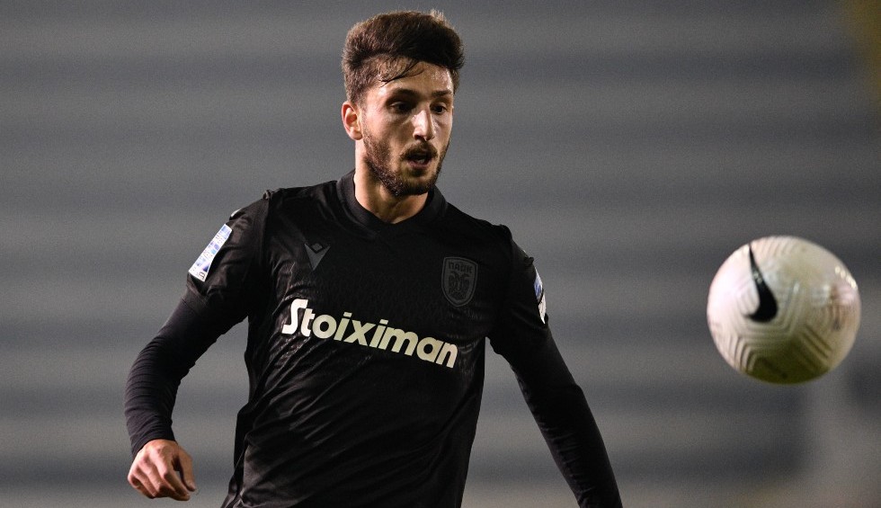 A generic square placeholder image with rounded corners in a figure.