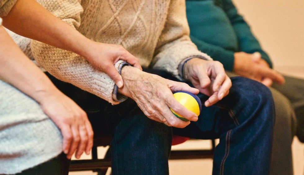 A generic square placeholder image with rounded corners in a figure.