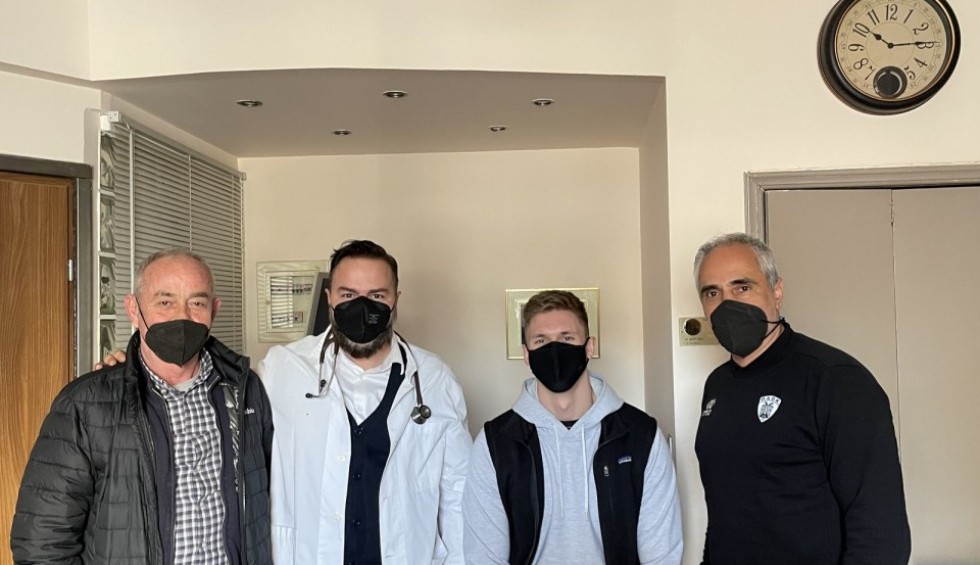 A generic square placeholder image with rounded corners in a figure.