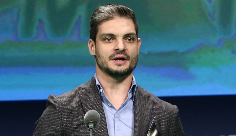 A generic square placeholder image with rounded corners in a figure.