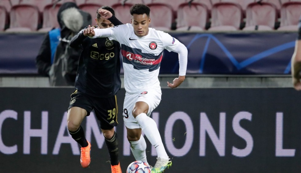 A generic square placeholder image with rounded corners in a figure.